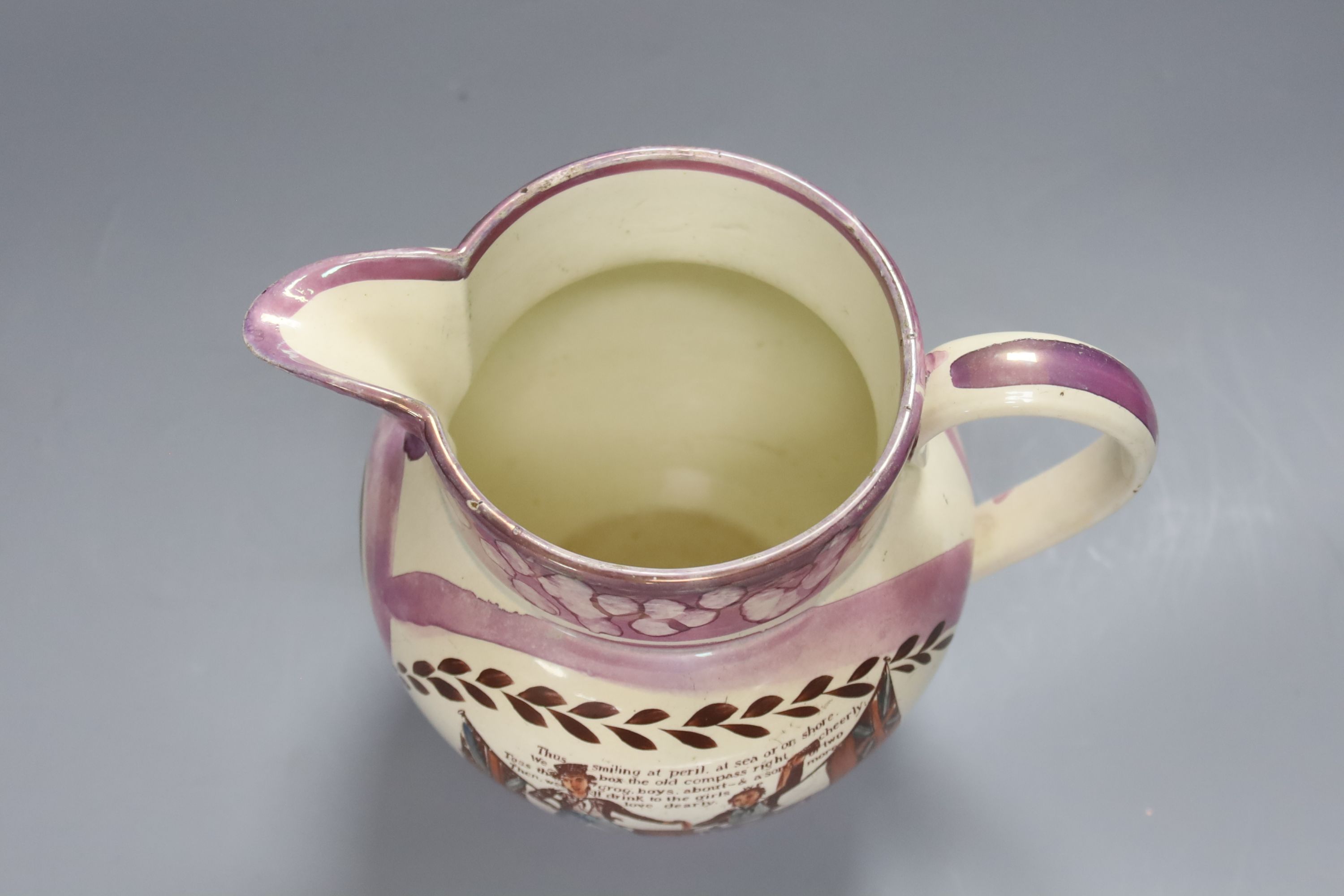 A 19th century Sunderland pink lustre jug, Masons Arms, height 18cm